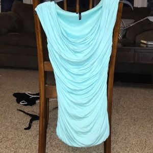 Light blue blouse.